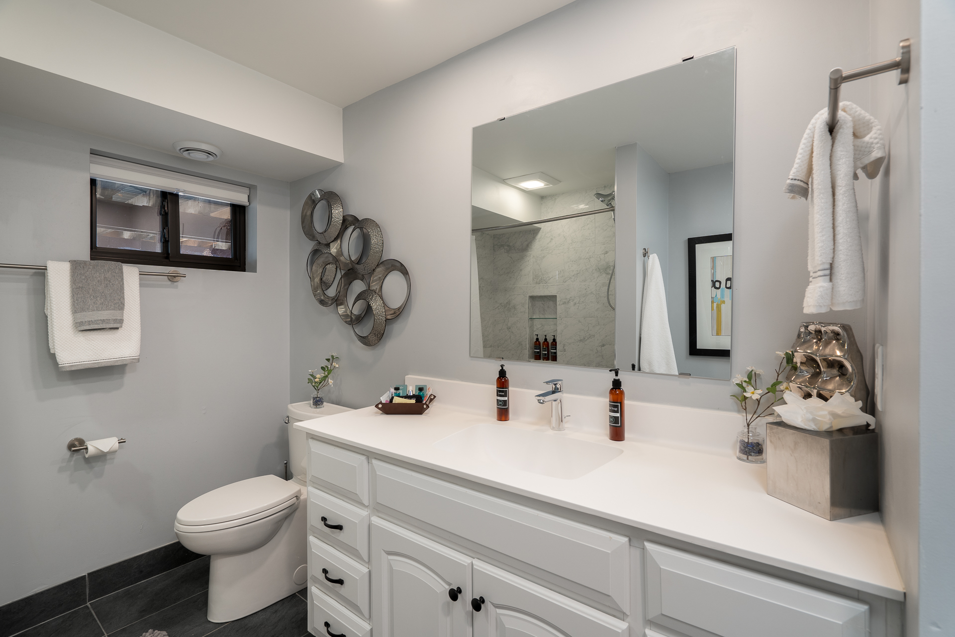 A stylish modern bathroom with minimalist design elements and elegant décor.