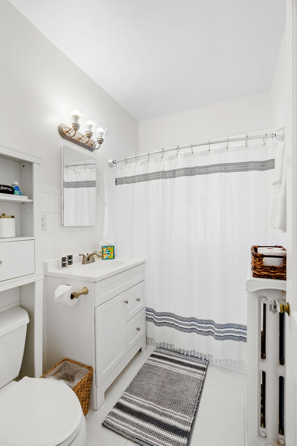 A stylish and serene bathroom with modern amenities.