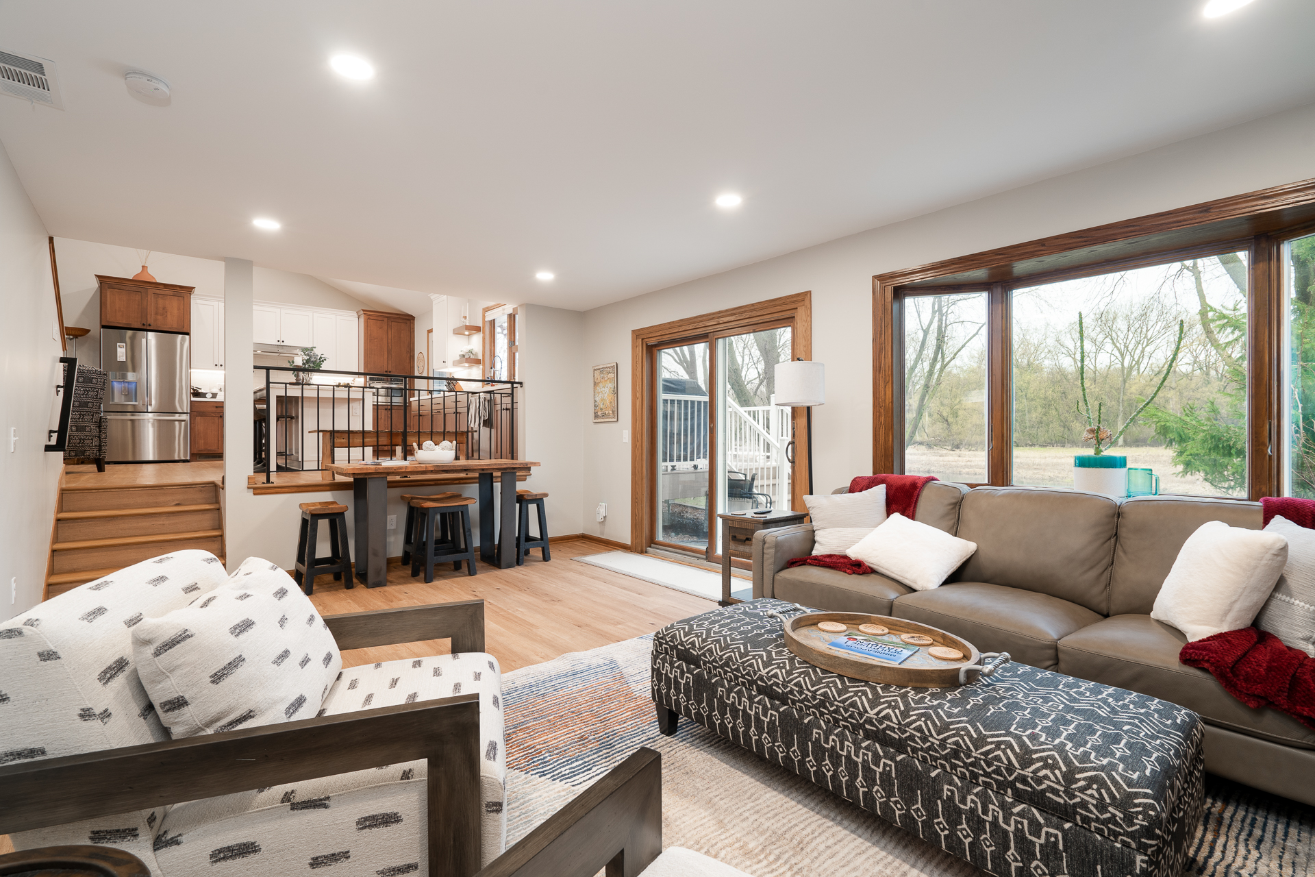 A stylish and inviting living room with modern decor and plenty of natural light.