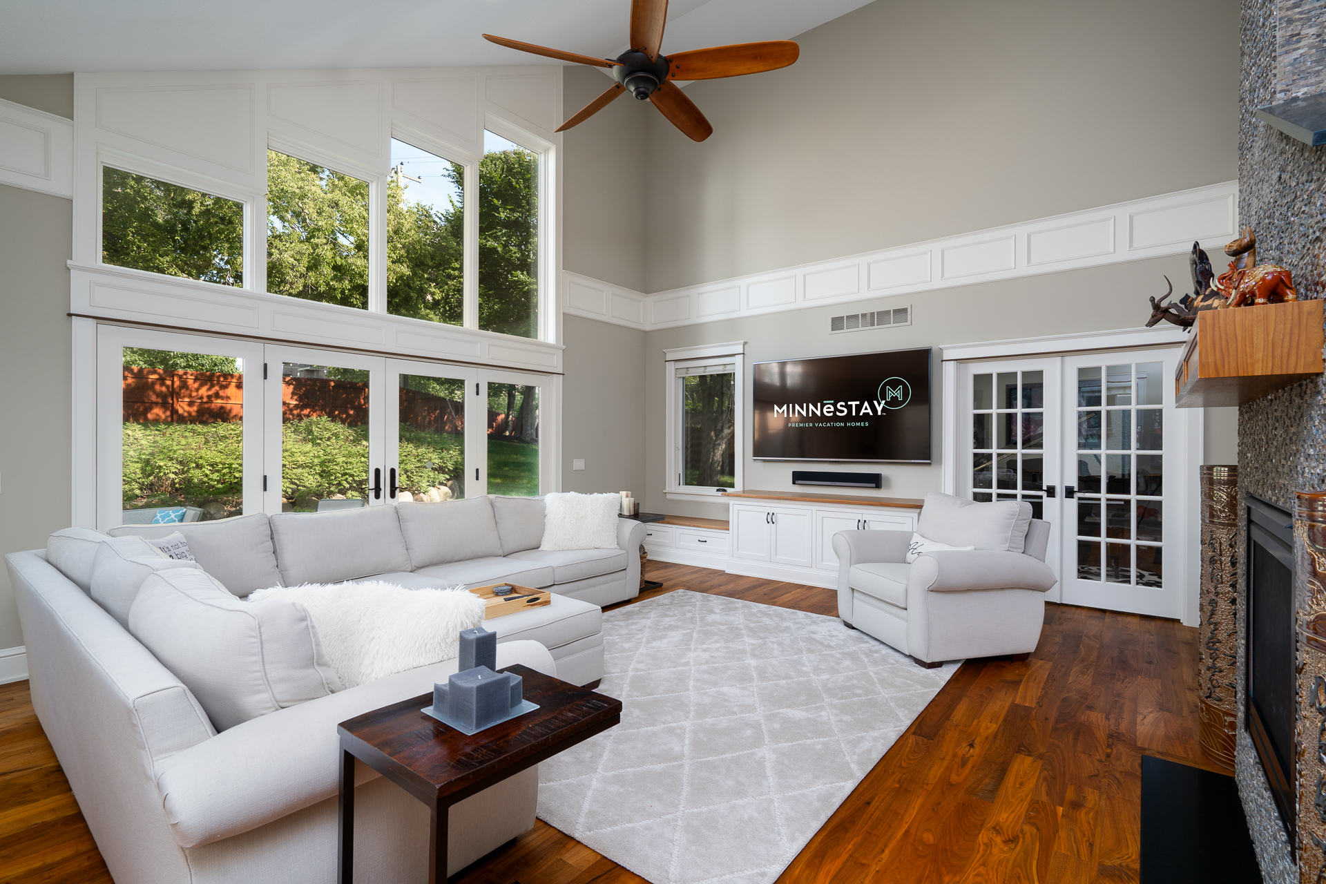 A cozy and modern living room with natural light and stylish decor.