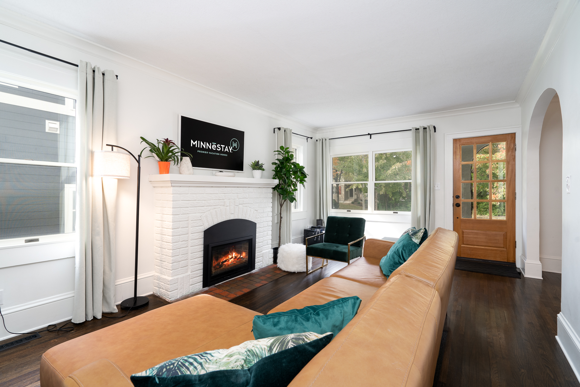 A cozy living room with a blend of modern and classic decor.