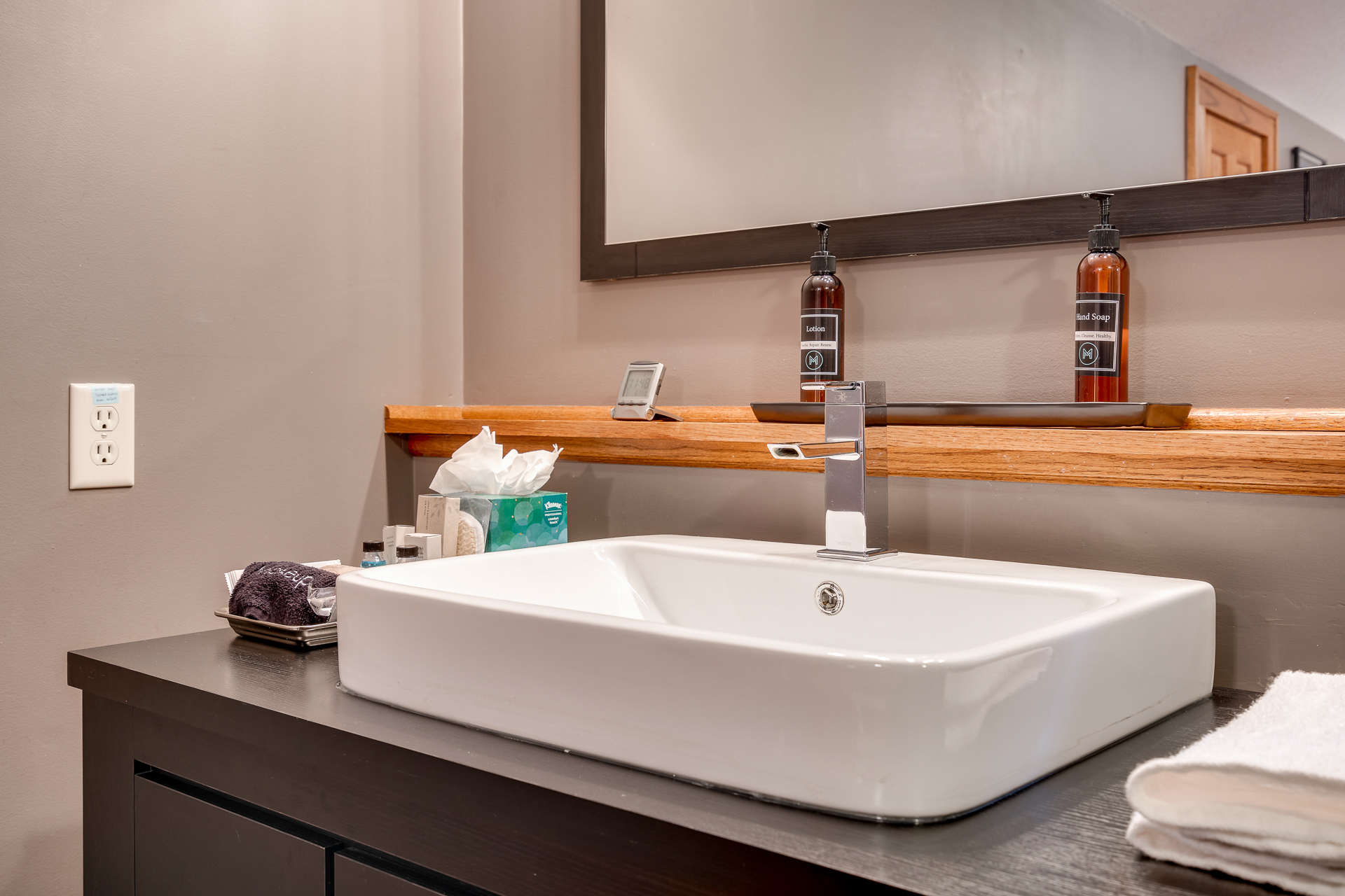 A modern bathroom sink setup featuring elegant design elements.
