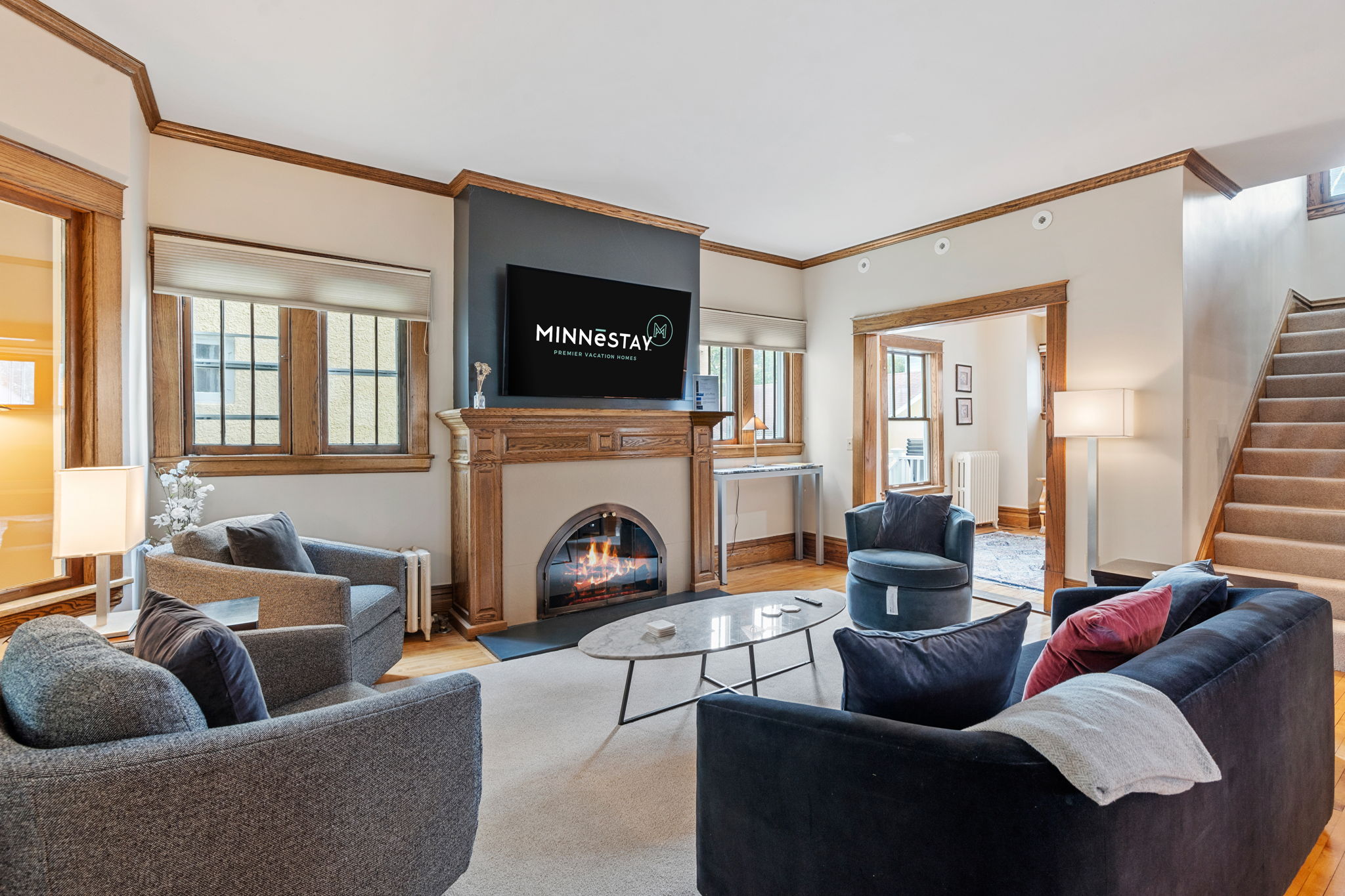 Cozy and modern living room featuring a fireplace and stylish decor.