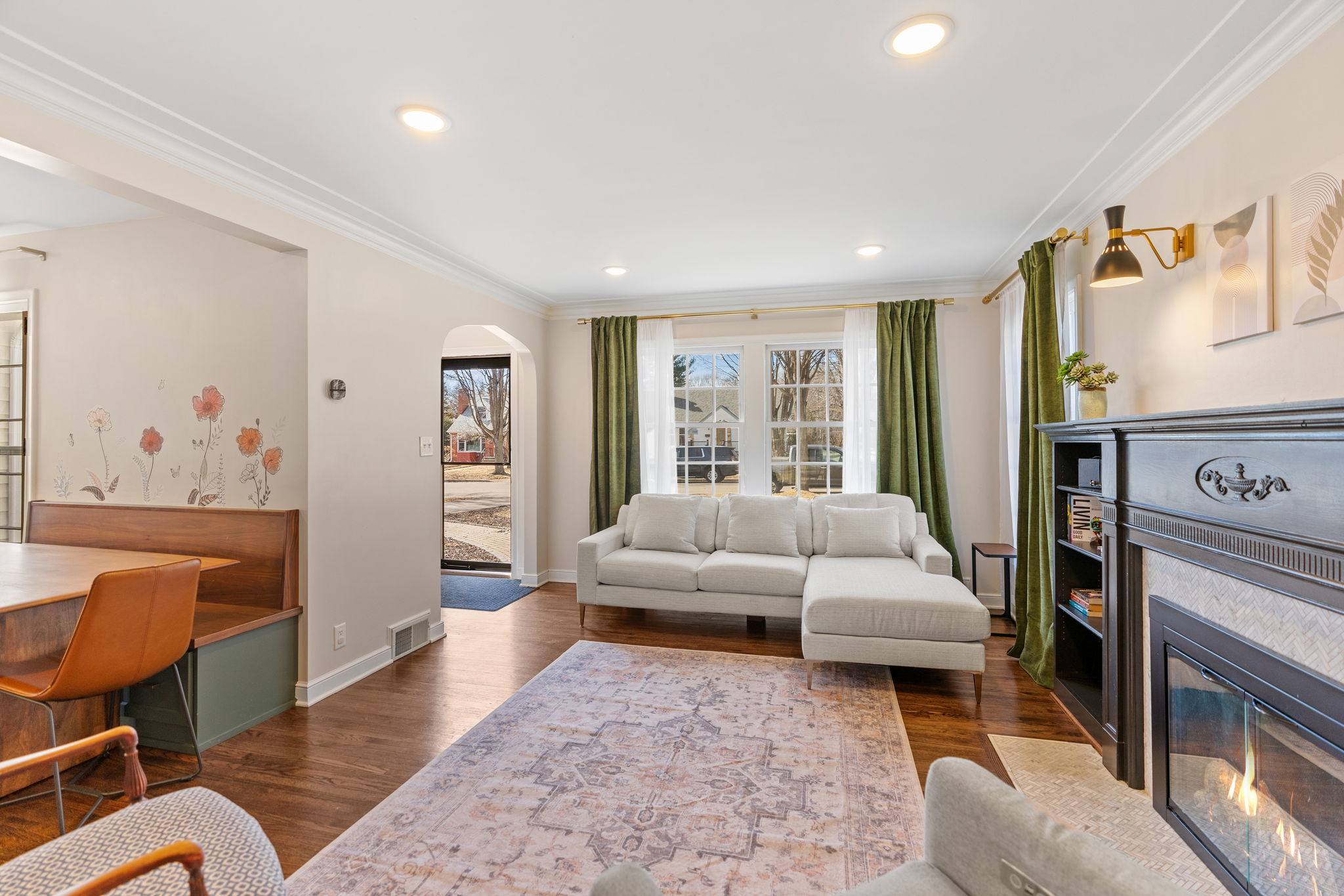 A stylish living room with a cozy sectional couch and natural light.