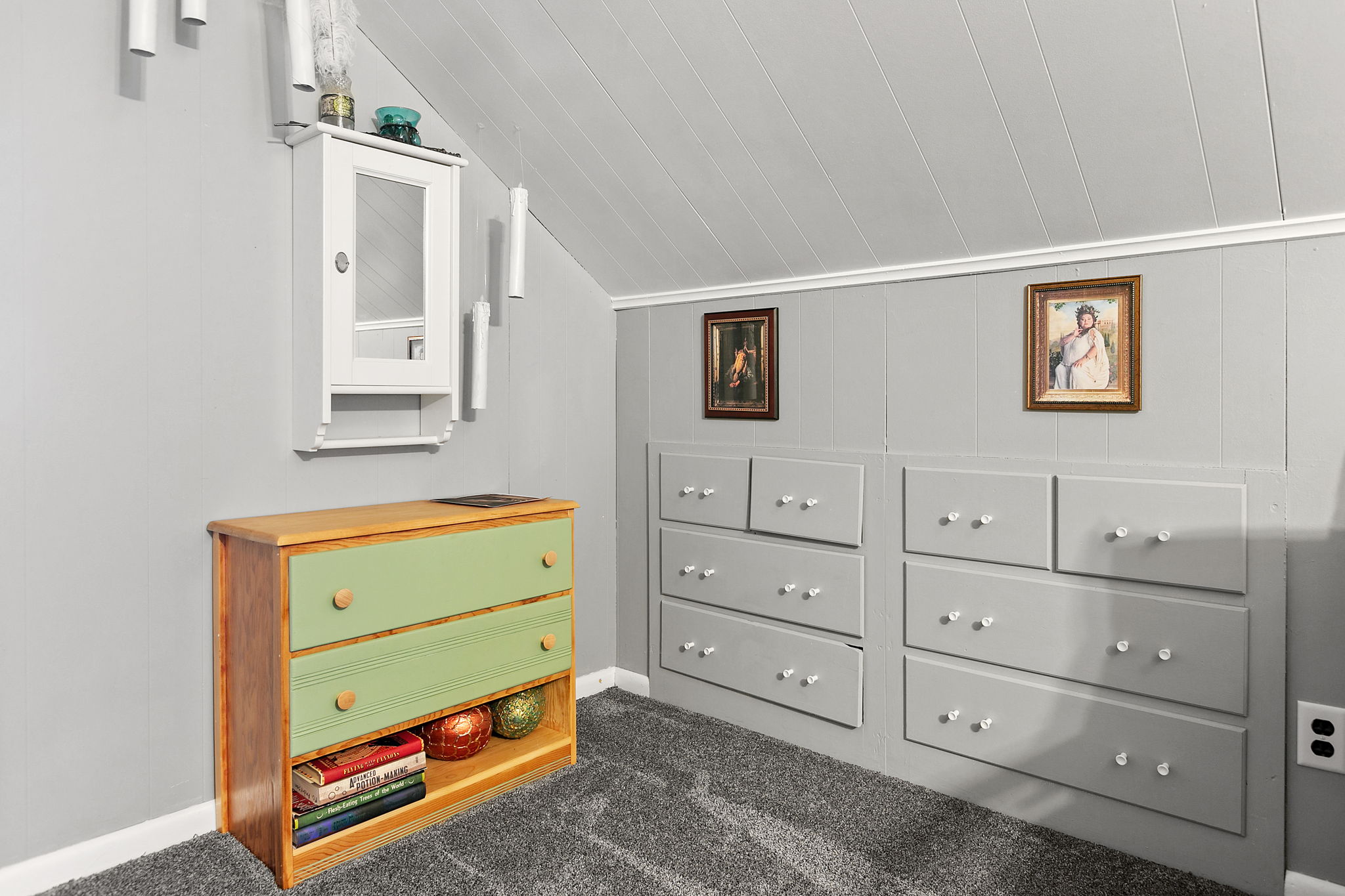 A cozy room featuring a unique blend of storage solutions and decor.