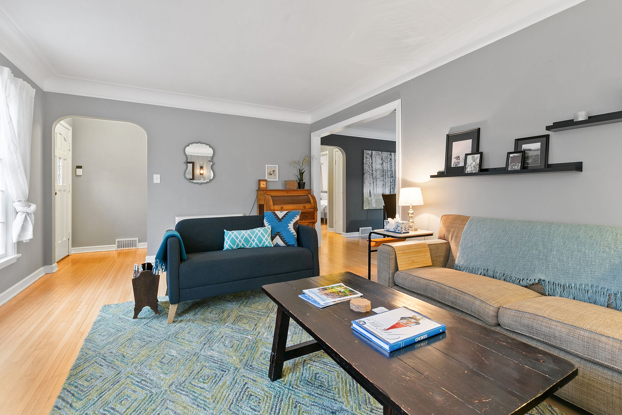 A cozy living room with stylish decor and warm colors.