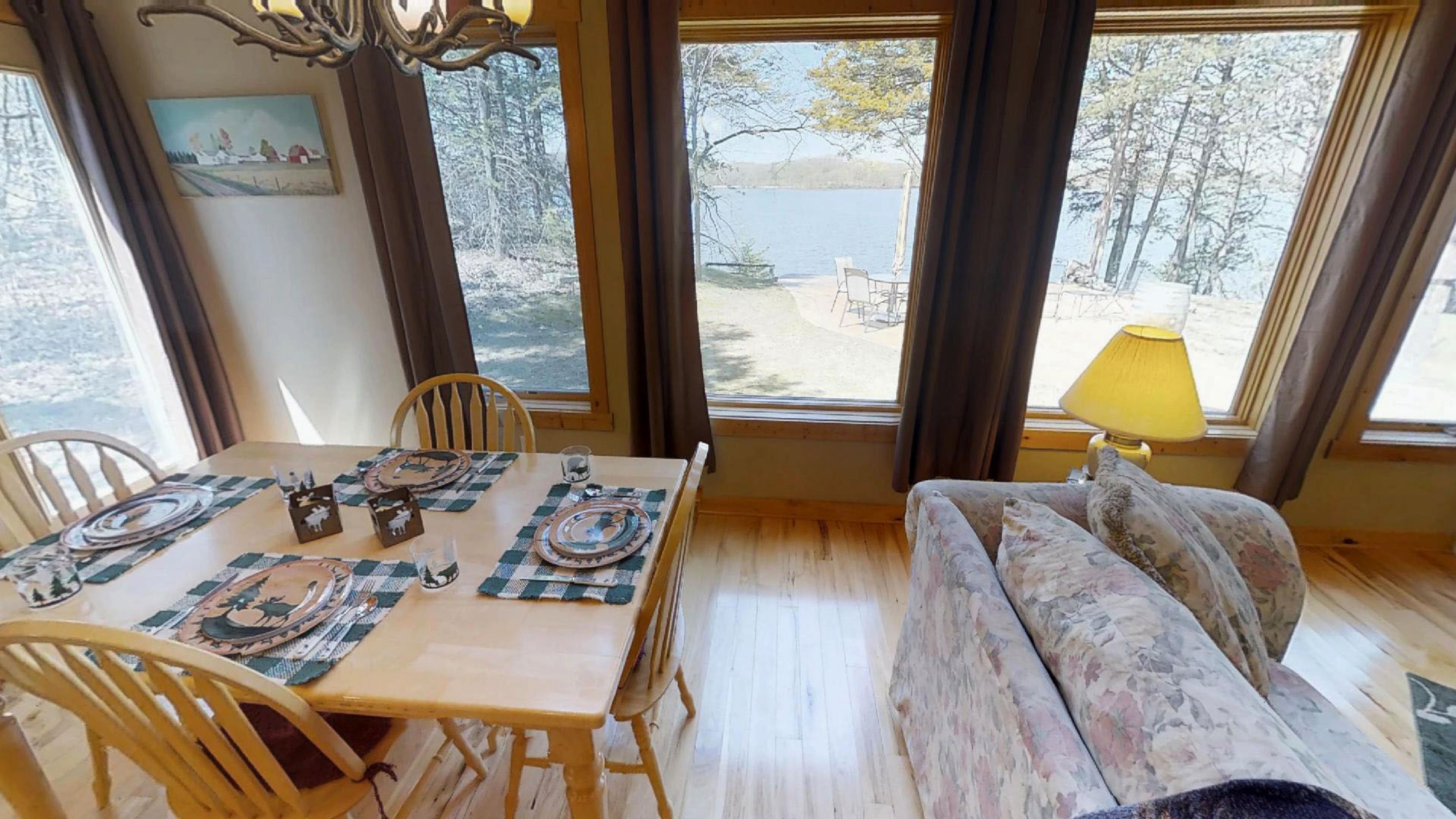 Cozy dining area with a beautiful lake view.