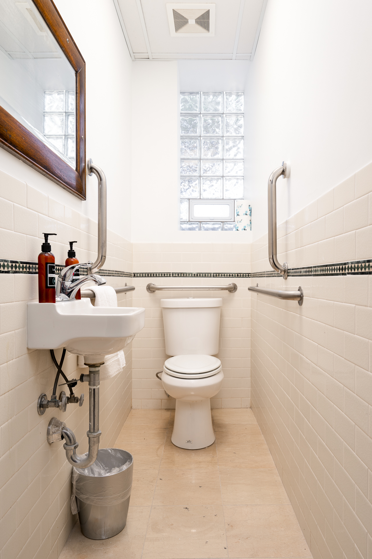 A bright and accessible bathroom with modern fixtures and a minimalist design.