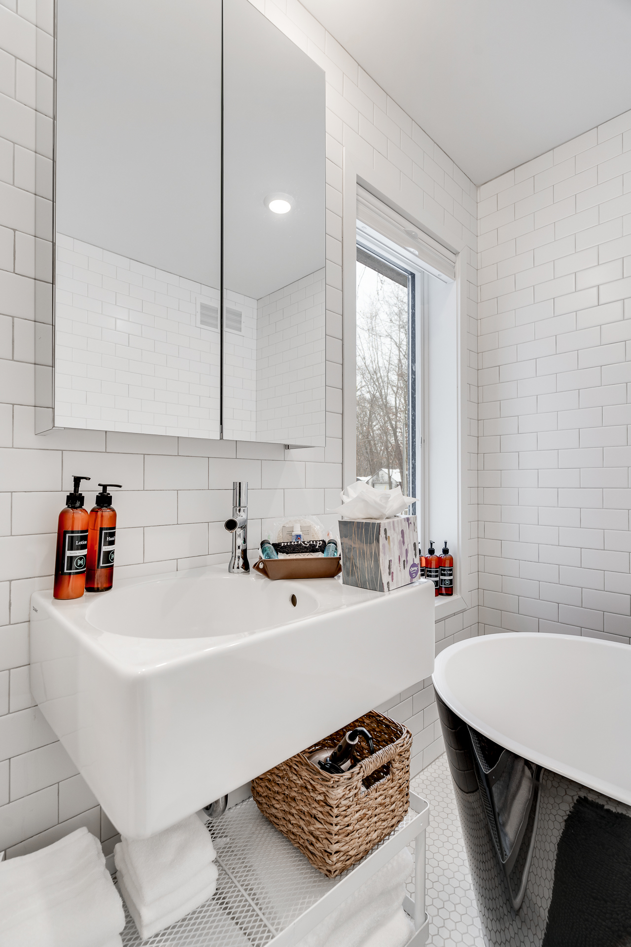 A modern bathroom featuring sleek design elements and minimalist decor.