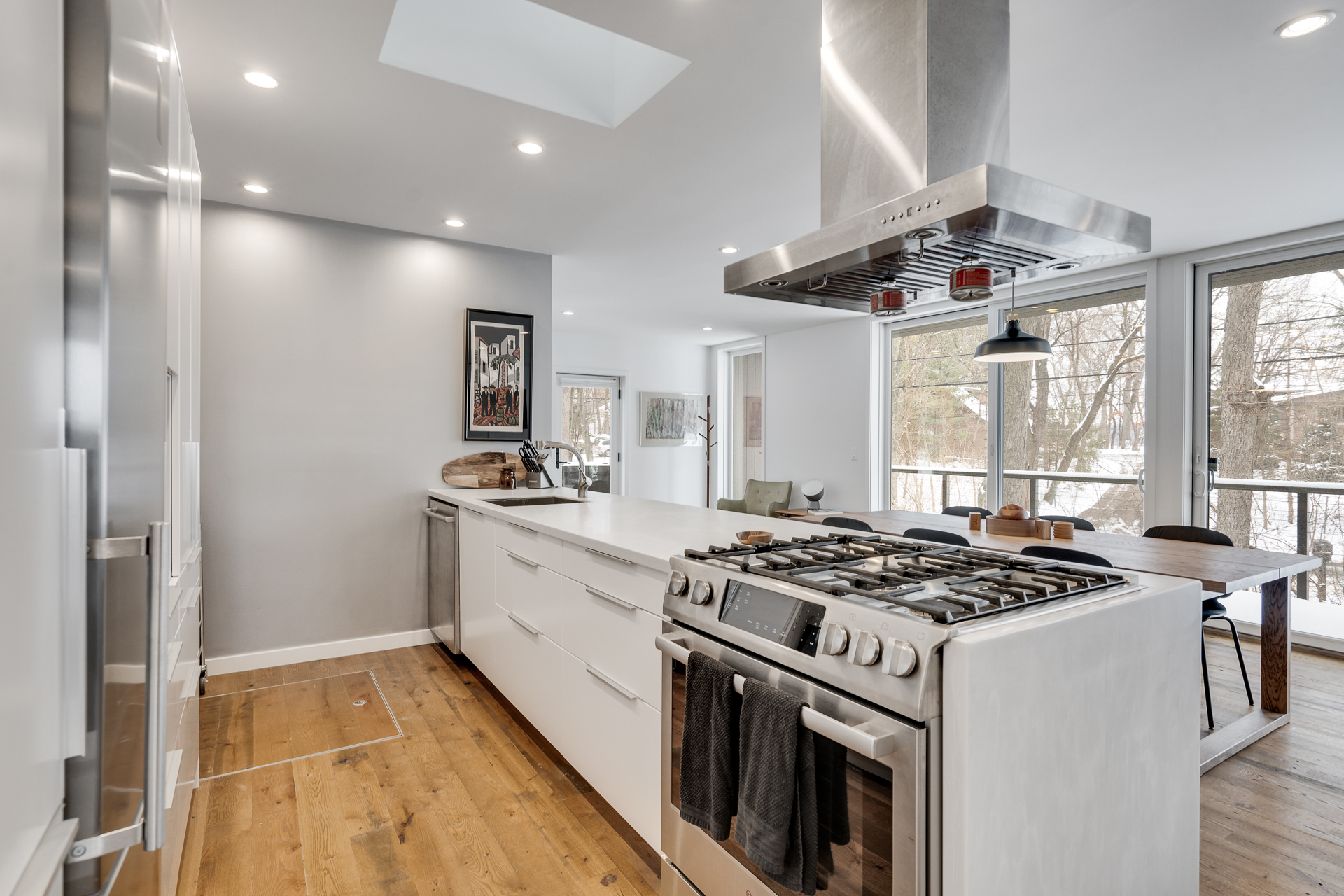 A modern kitchen with sleek appliances and a bright, open layout.