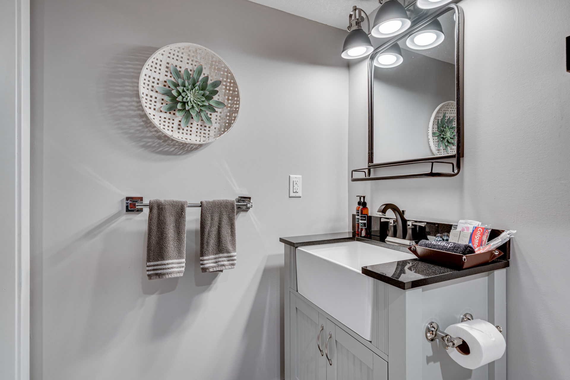 A modern bathroom featuring minimalist decor and stylish fixtures.