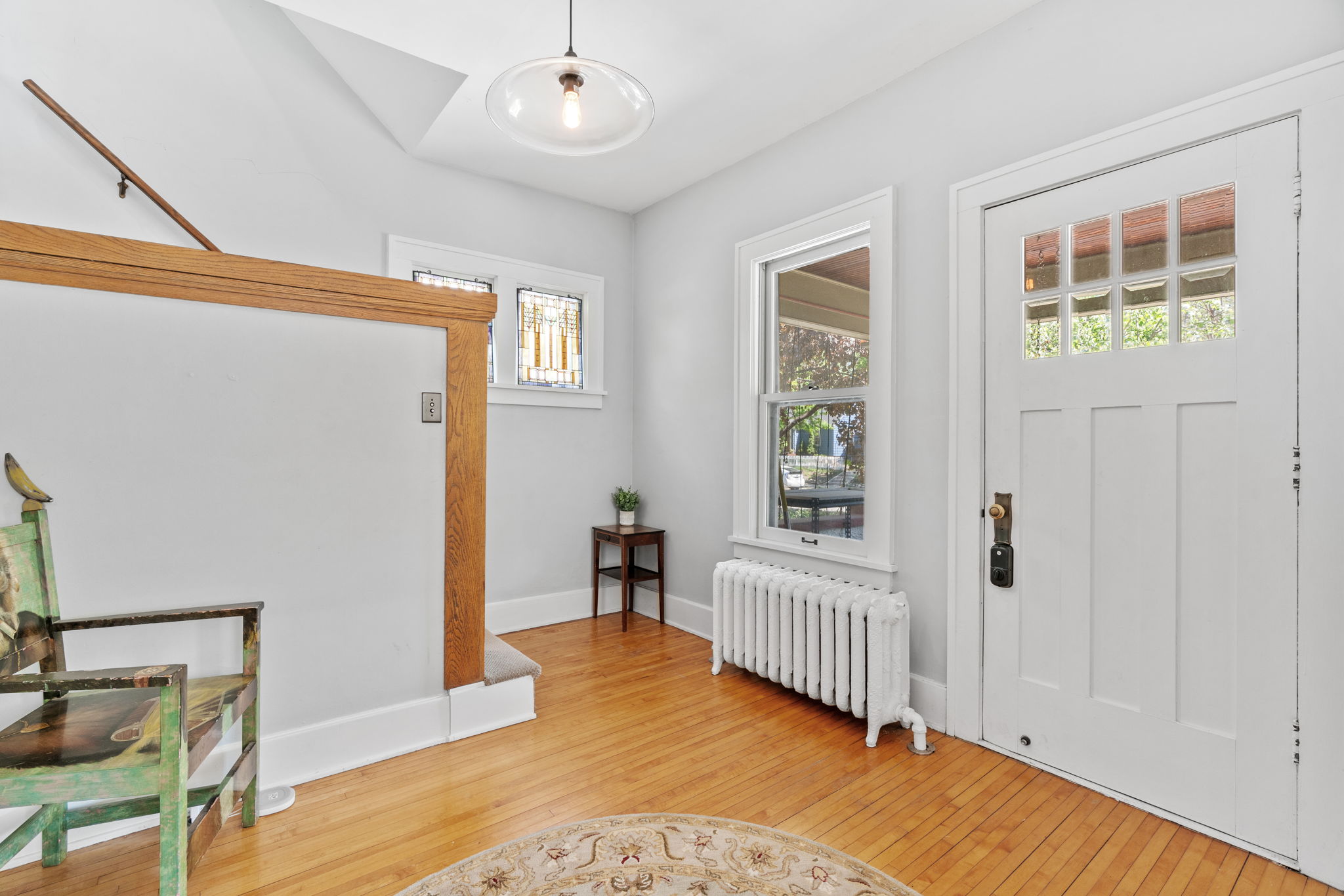 A stylish and inviting entryway with a blend of modern design and classic touches.