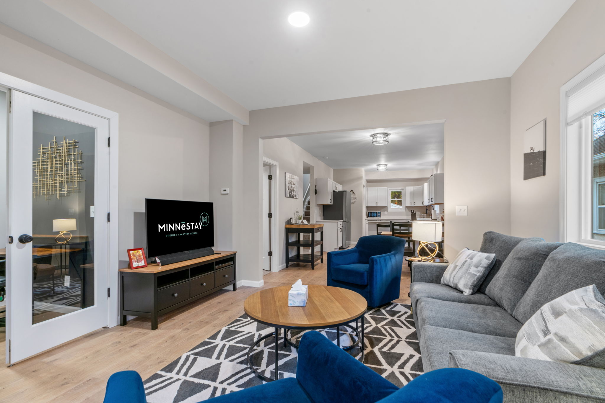 A modern living area with stylish furnishings and a warm atmosphere.