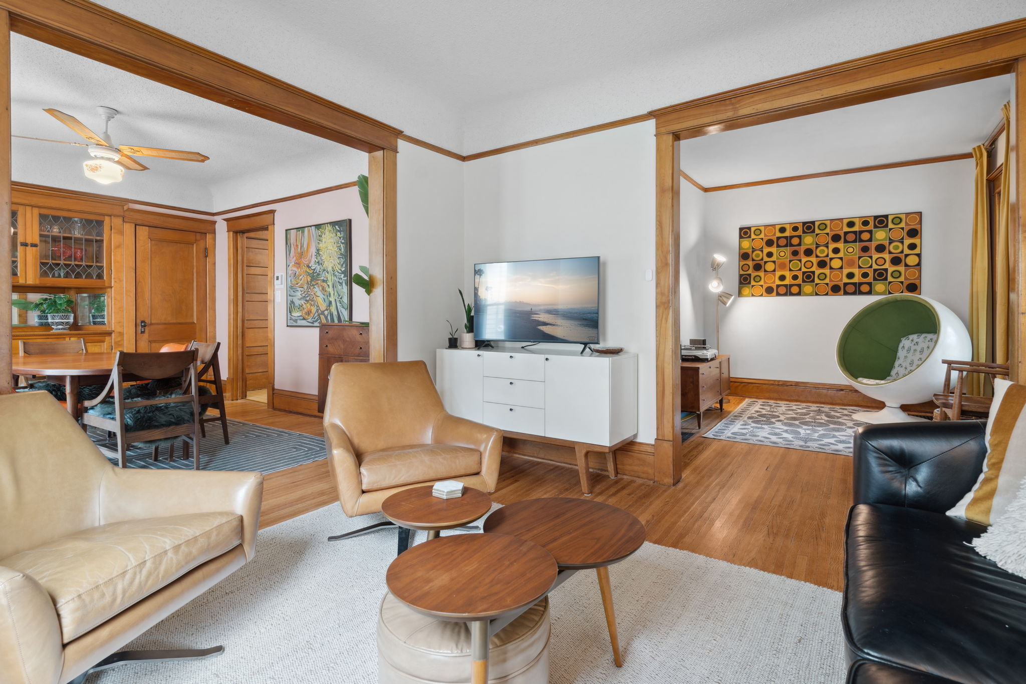 Stylish living area combining modern and vintage decor elements.