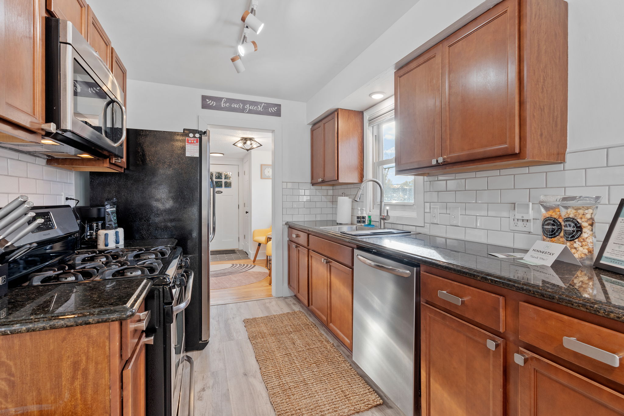 A warm and inviting kitchen with modern amenities and cozy decor.