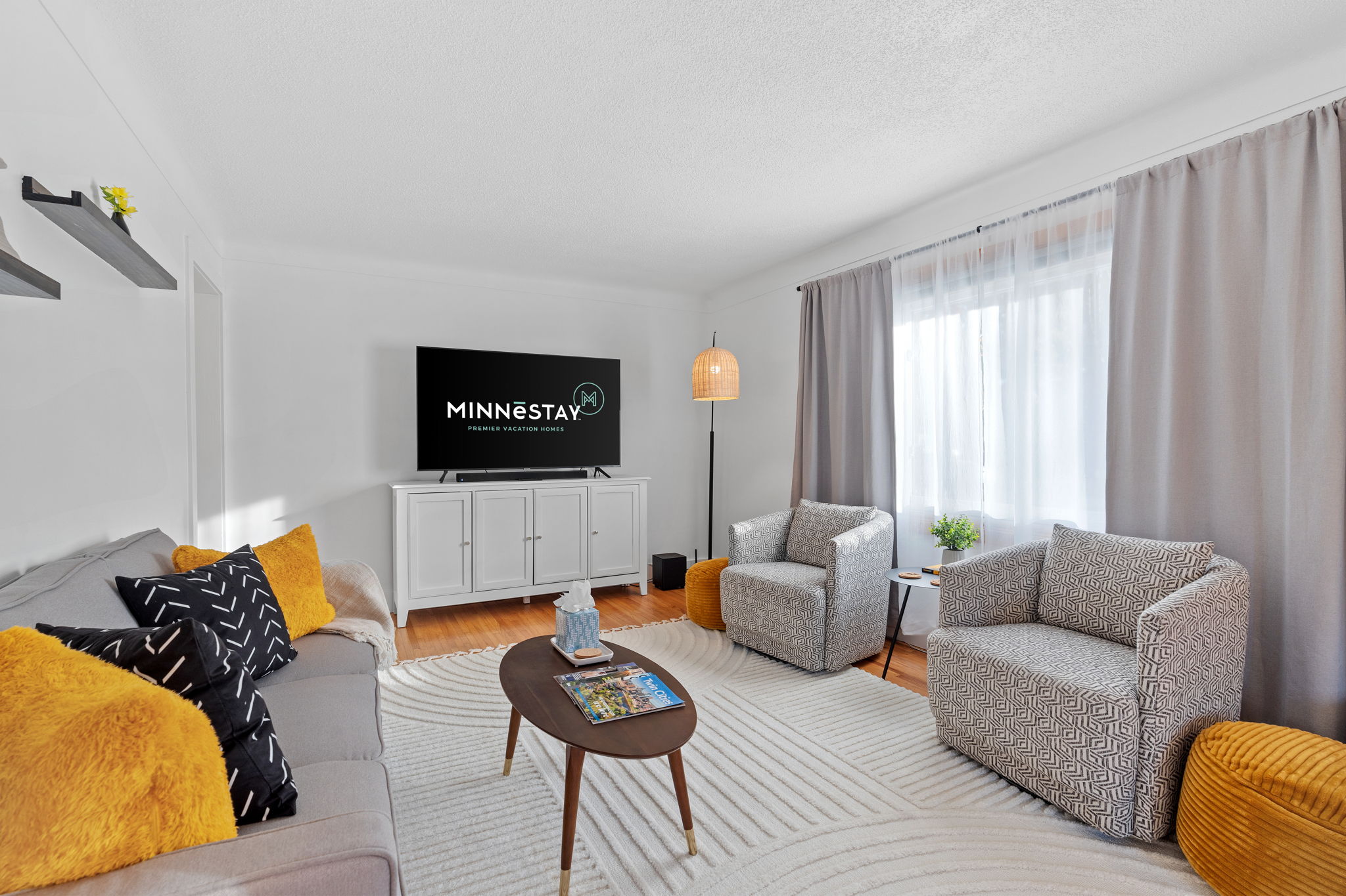 A stylish living room featuring modern decor and cozy seating.