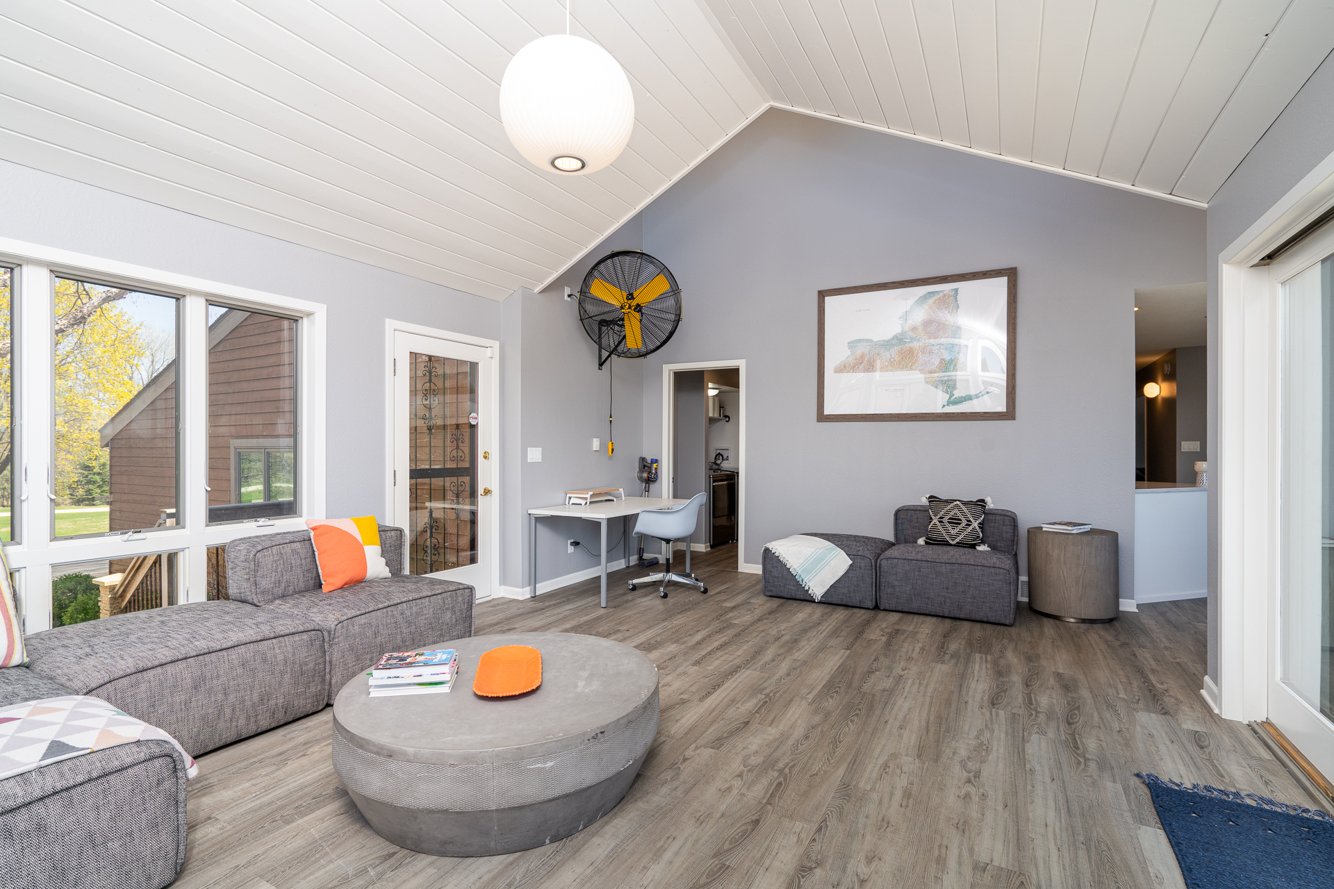 Cozy modern living room with bright colors and natural light.