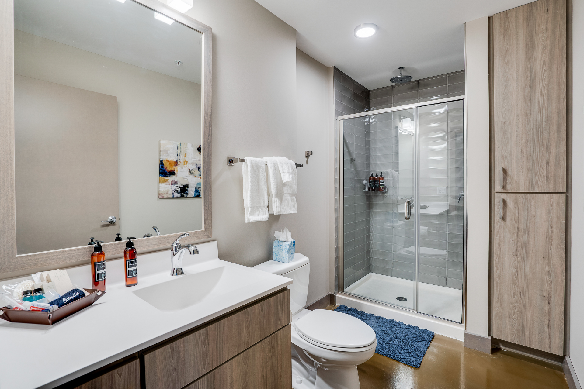A modern bathroom featuring sleek design and neutral tones.
