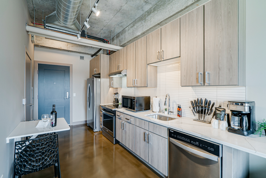 A sleek urban kitchen with modern appliances and stylish decor.