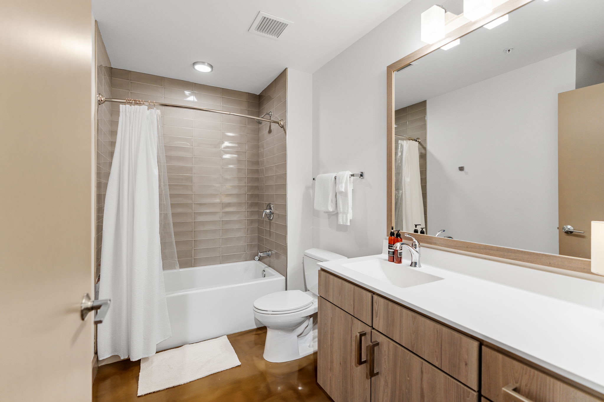 A modern and stylish bathroom with sleek finishes and a clean design.