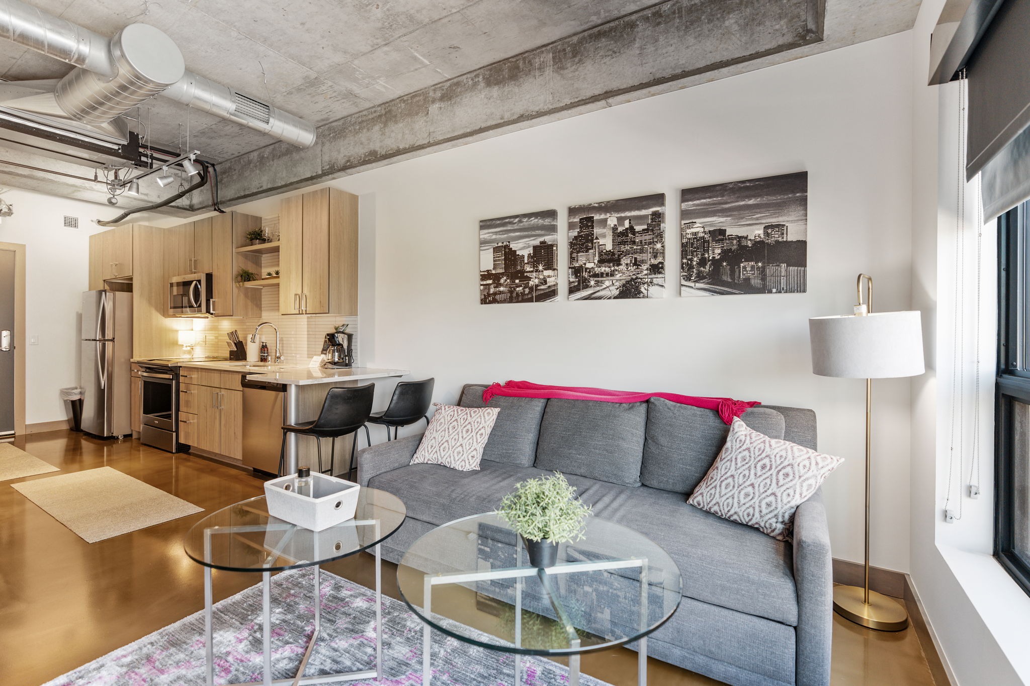 A chic loft apartment showcasing modern design elements and urban decor.