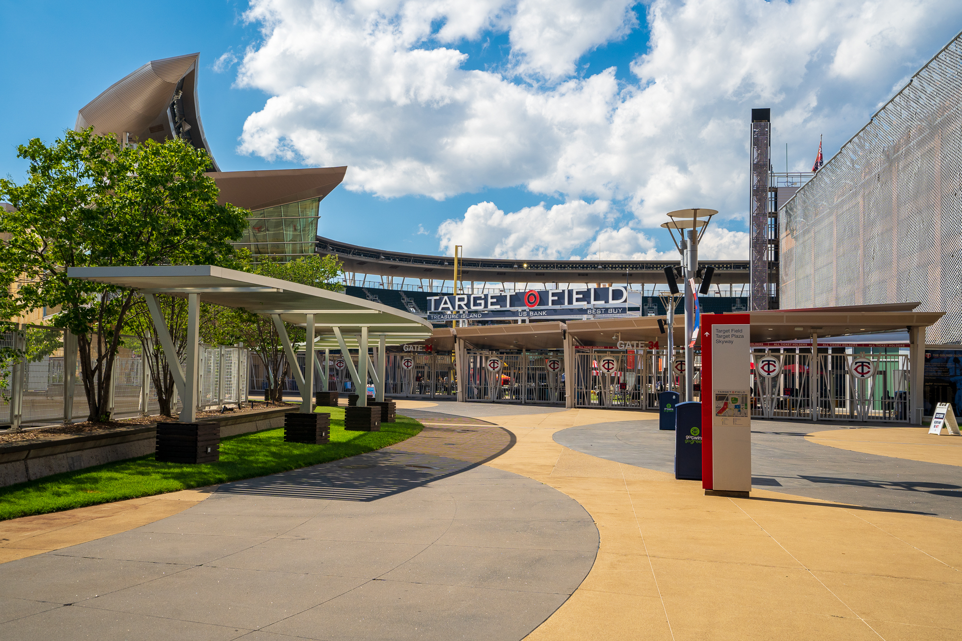 The welcoming entrance of Target Field on a sunny day with blue skies.