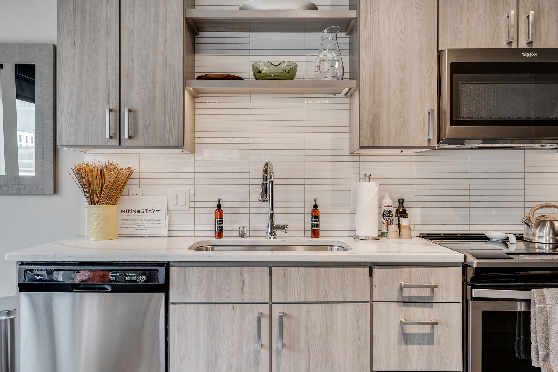 A modern kitchen featuring sleek cabinetry and minimalist design.