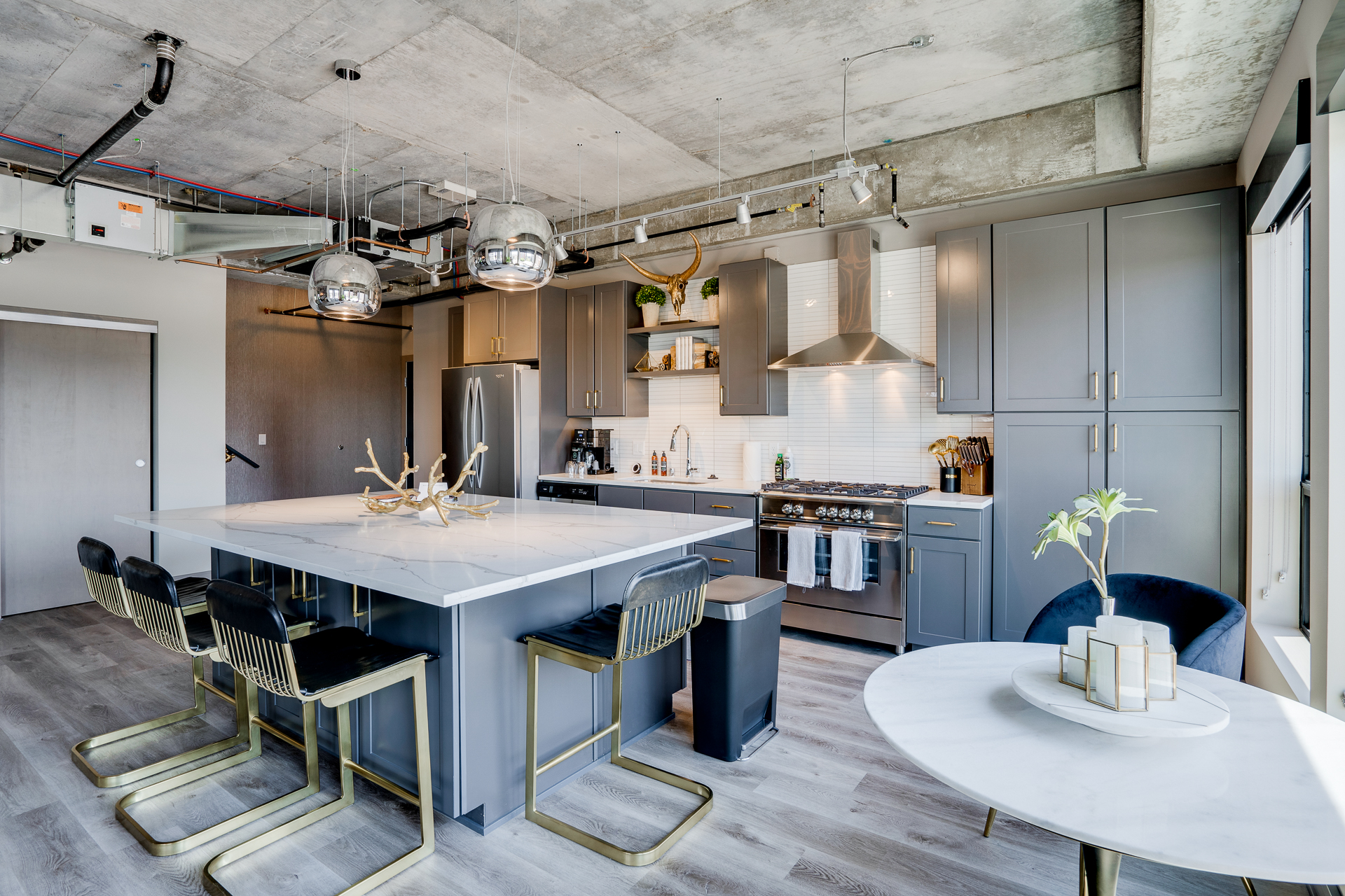 A stylish and modern kitchen with an industrial touch.