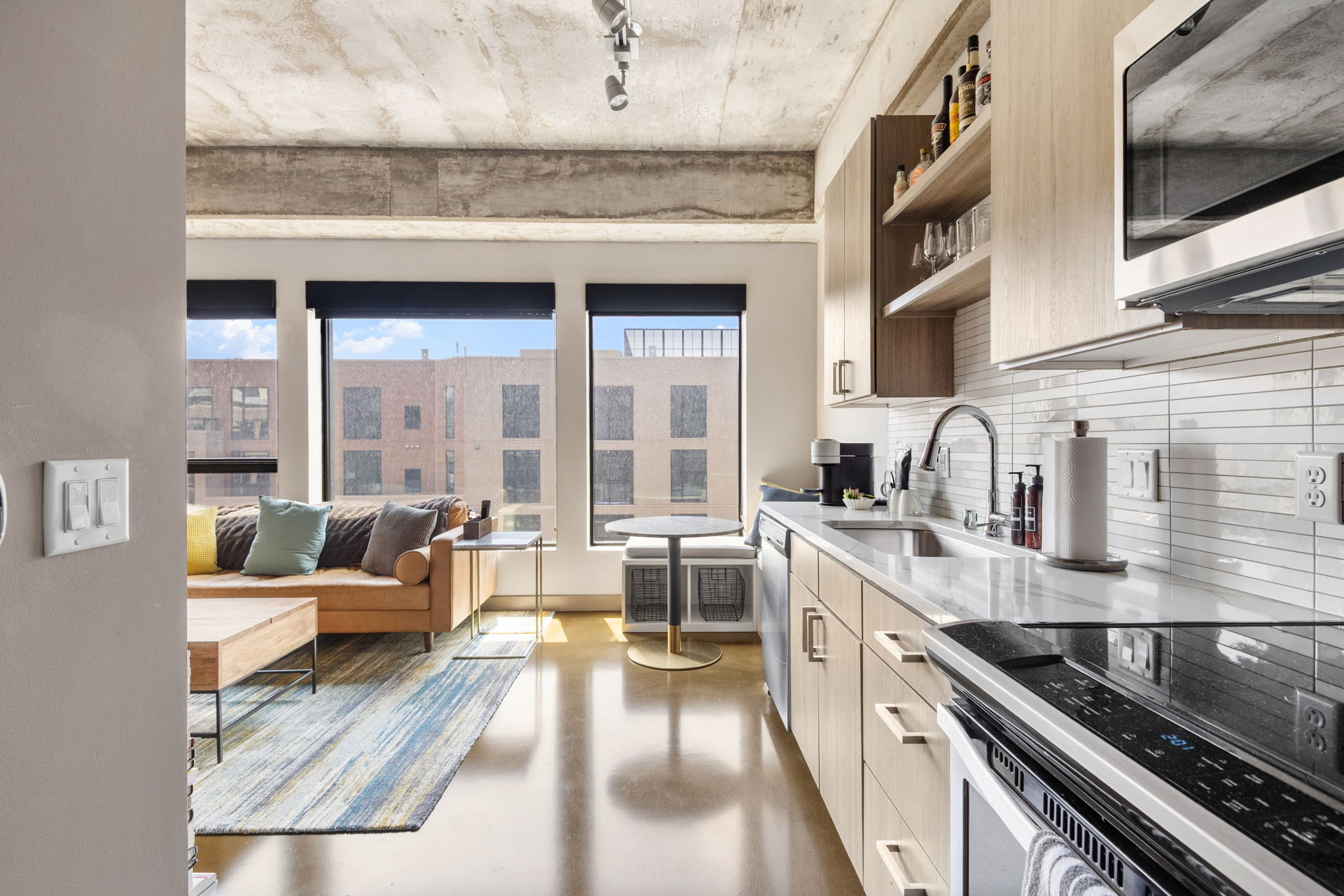 Stylish urban apartment with a modern kitchen and cozy living area.