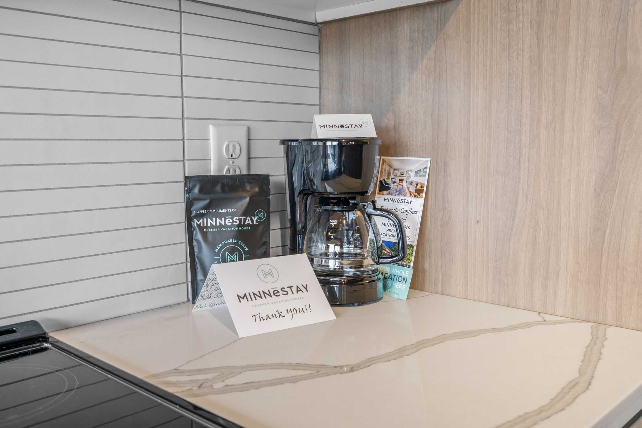 Cozy coffee corner featuring MINNESTAY coffee and amenities.