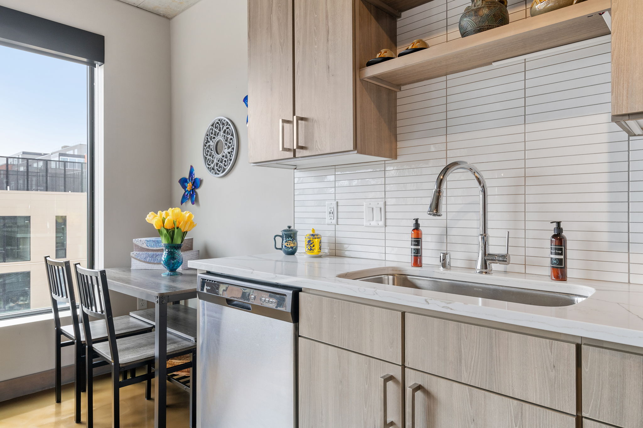 A stylish and modern kitchen with natural light.