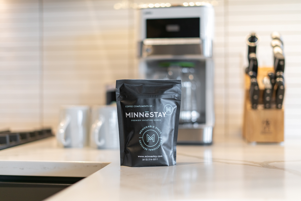 A stylish coffee bag from MINNESTAY in a modern kitchen setting.