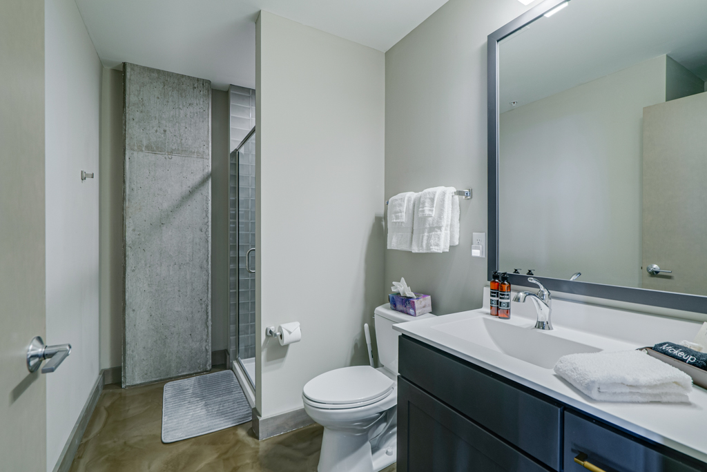 A modern bathroom featuring sleek design elements and minimalist decor.