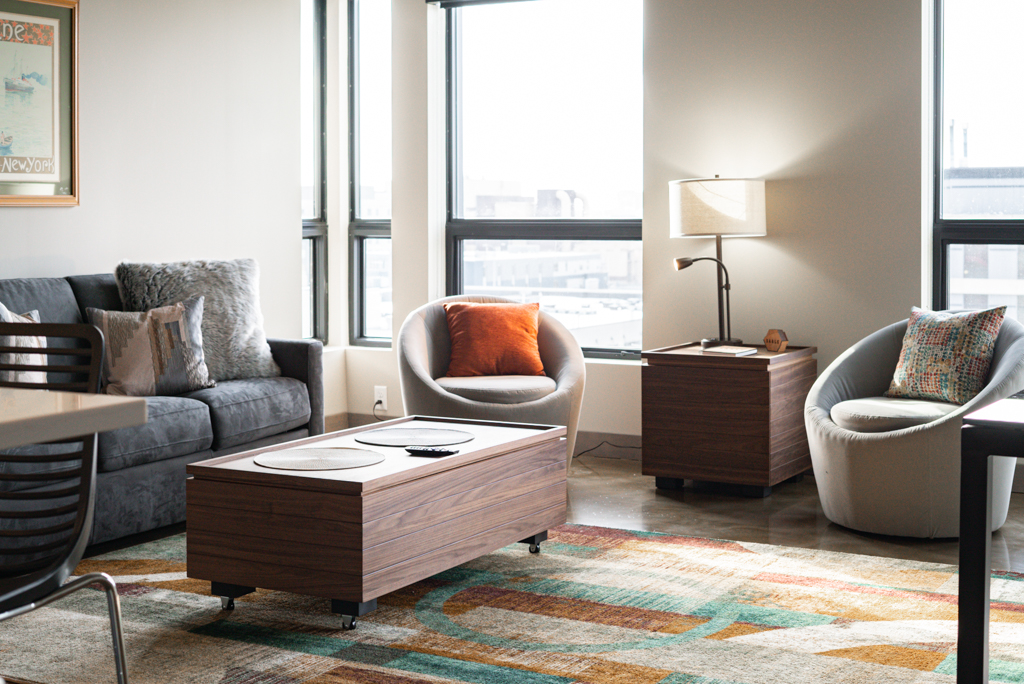 A contemporary living room featuring stylish furnishings and natural light.