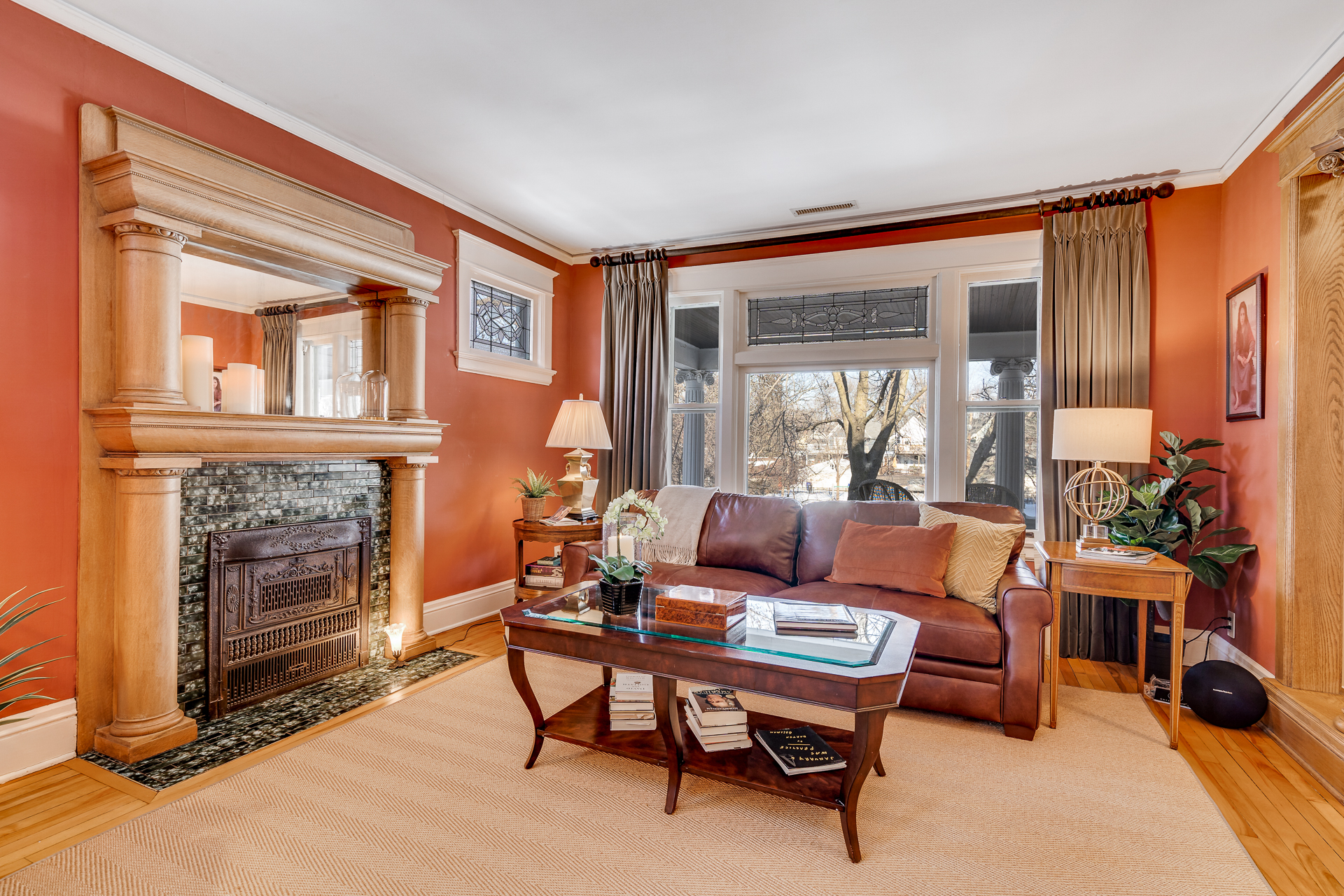 Cozy and elegant living room with a charming fireplace and inviting decor.