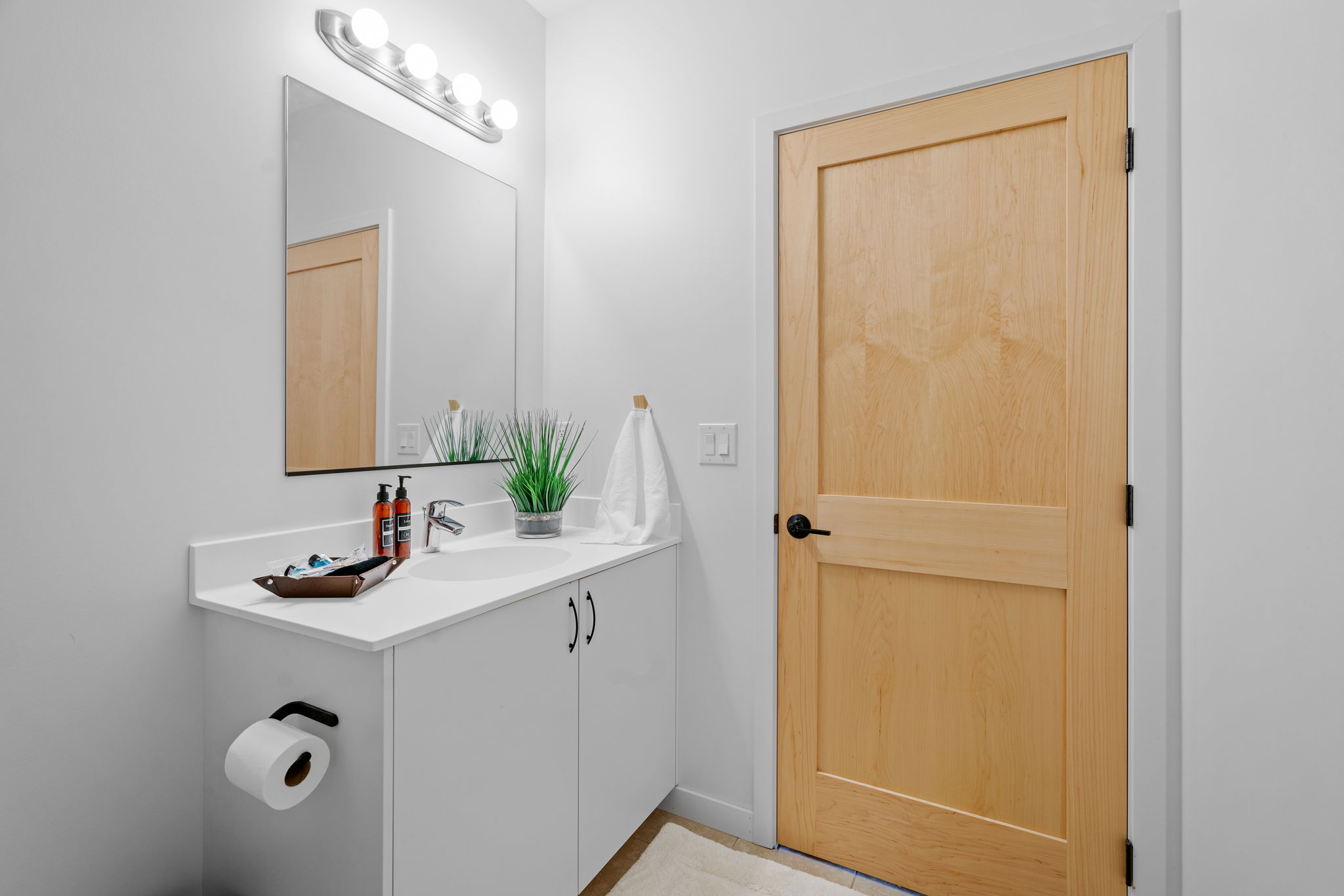 A modern bathroom with minimalistic design and functional features.