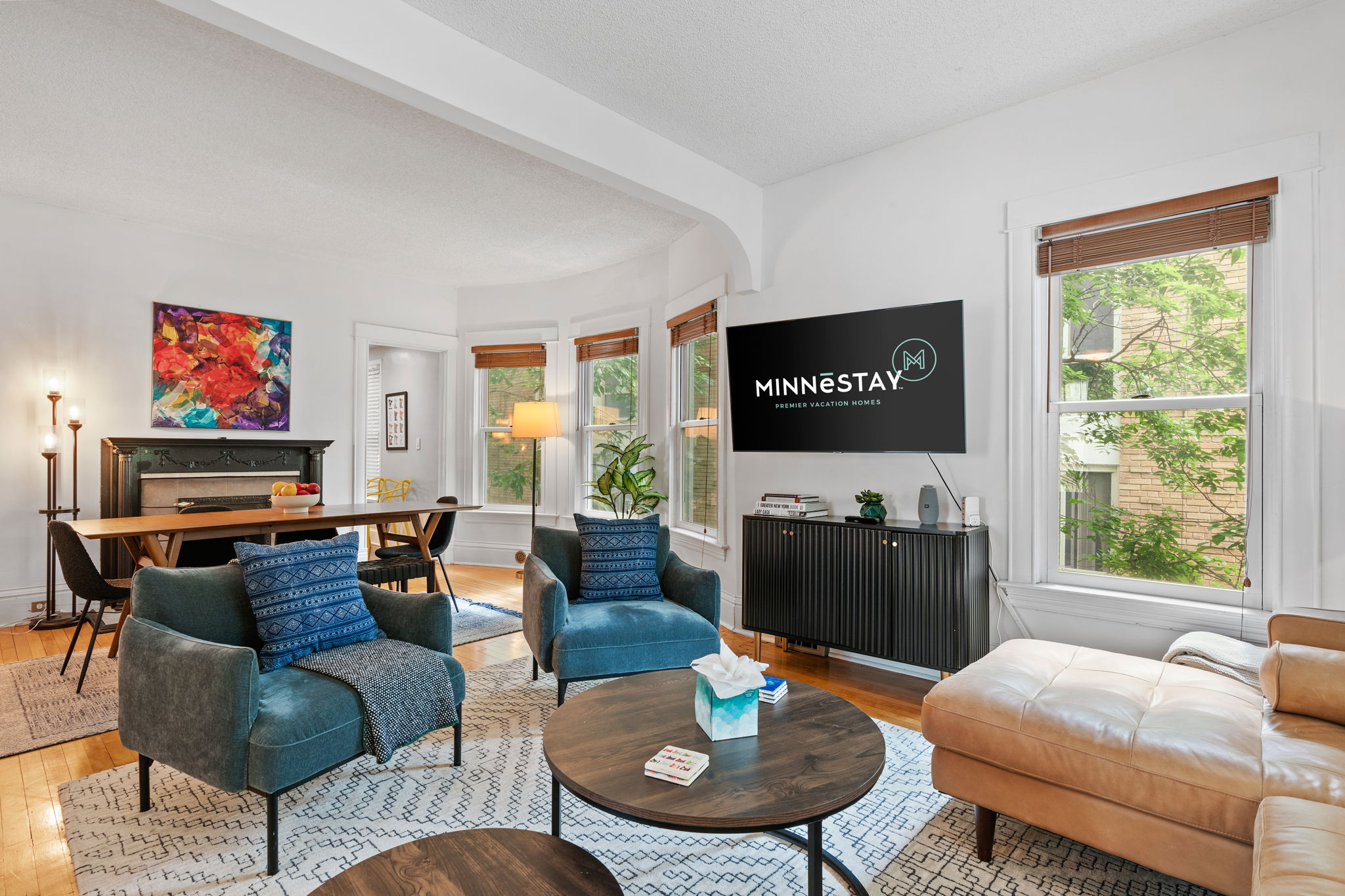 A warm and inviting living room featuring modern furnishings and natural light.