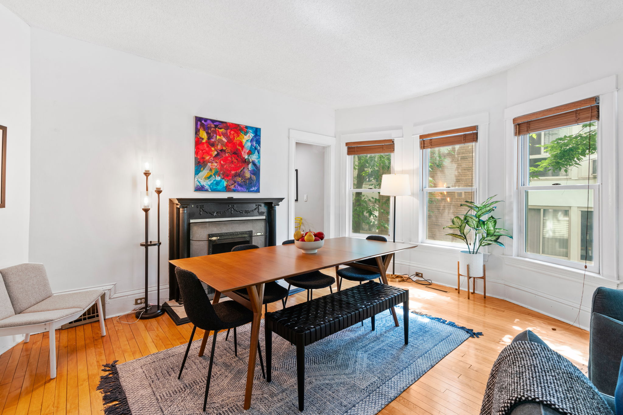 A stylish and modern dining room with natural light and elegant decor.