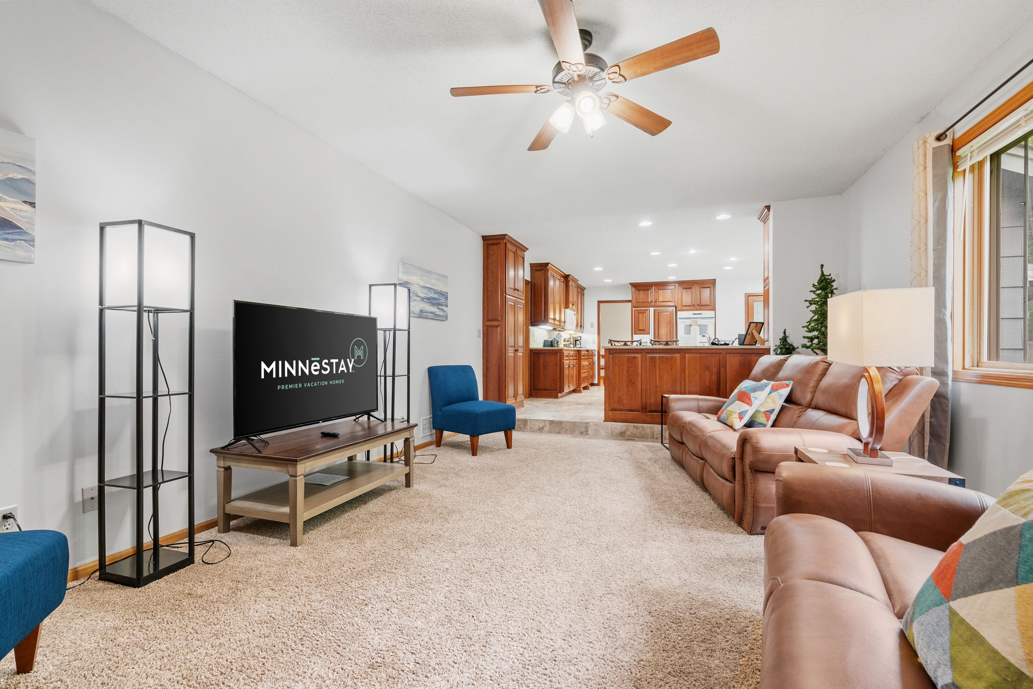 Cozy living room featuring leather furniture and a welcoming layout.