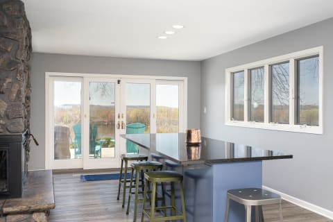 Casual bar seating with sidling glass doors to the backyard