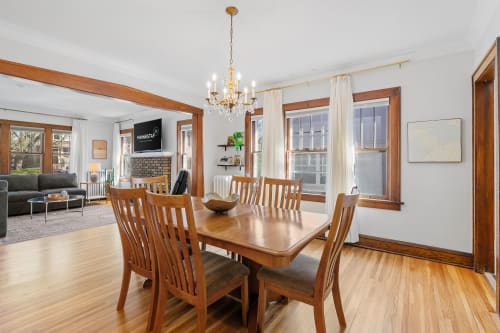 A stylish dining area with a cozy connection to the living space.