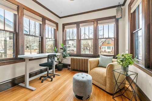 A cozy workspace filled with natural light.