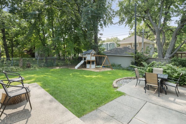 Backyard with a playset and patio