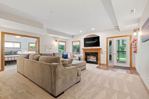 Cozy living room with a sectional sofa and fireplace