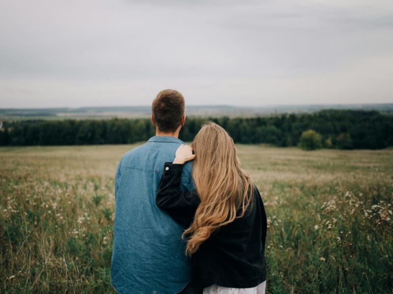 A couple sharing a quiet moment outdoors
