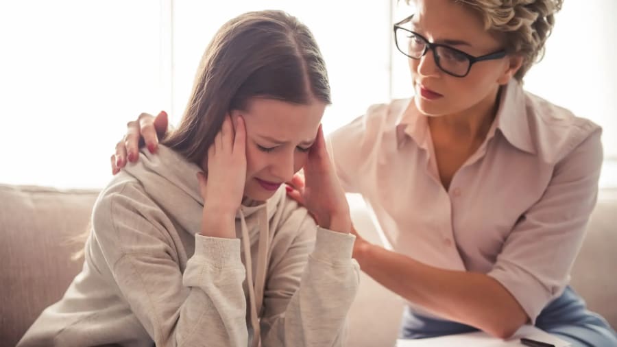 A therapist offering support during a counseling session