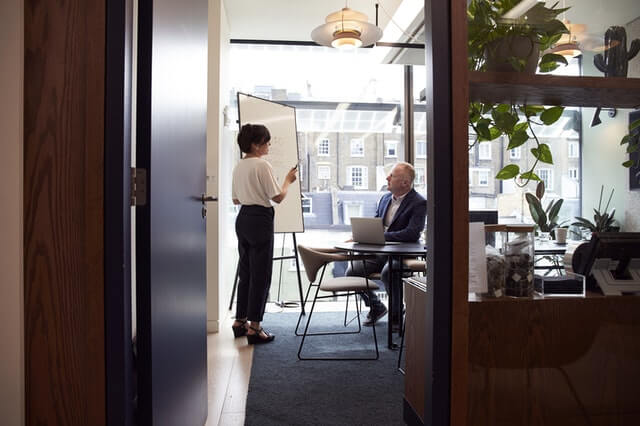 Business woman and man in a meeting