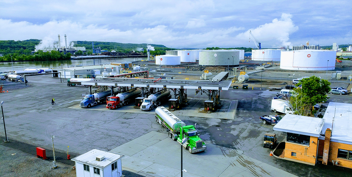 trucks lined up at fuel storage