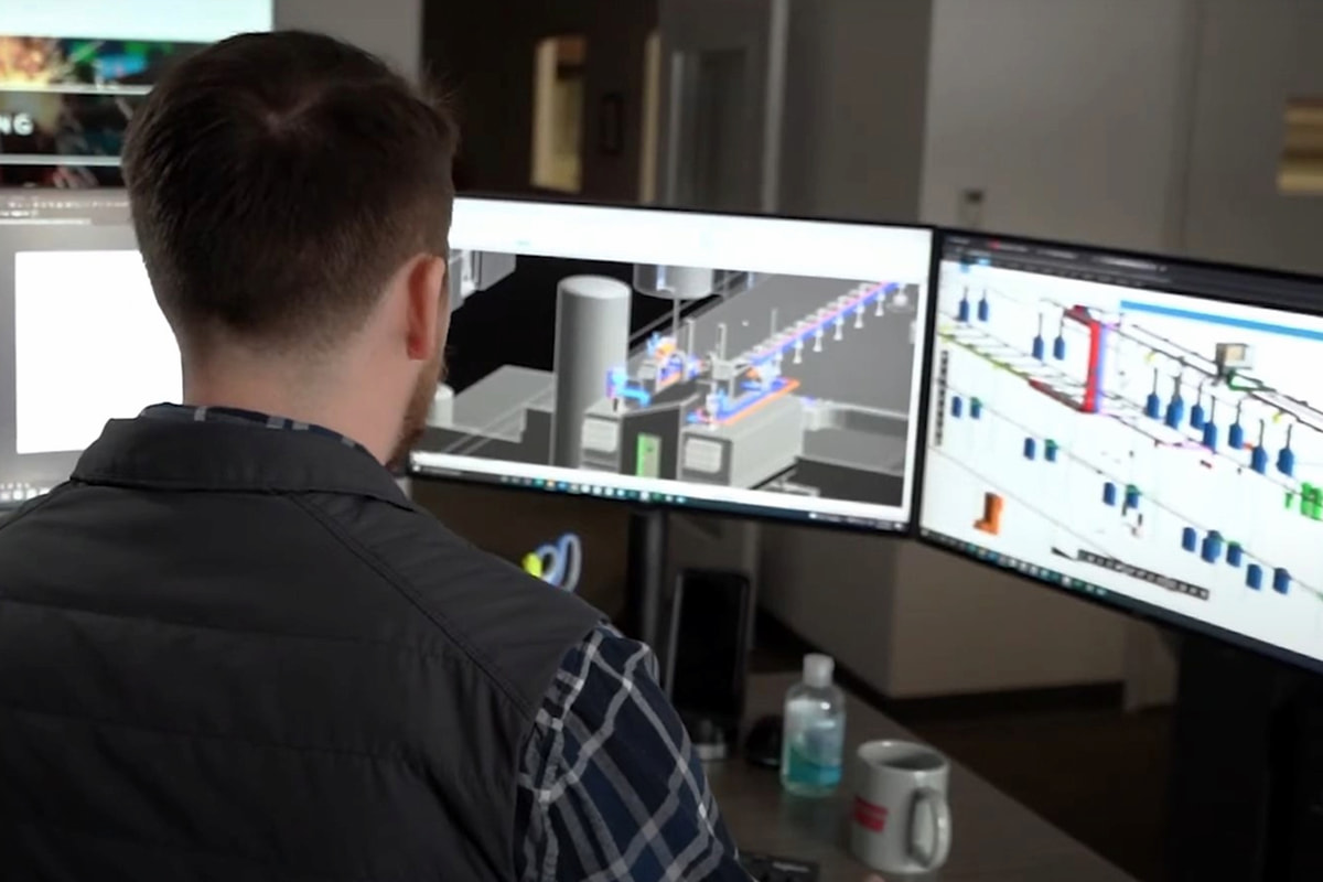 Engineer reviewing updated process piping model in Autodesk Navisworks for mechanical system layout validation.