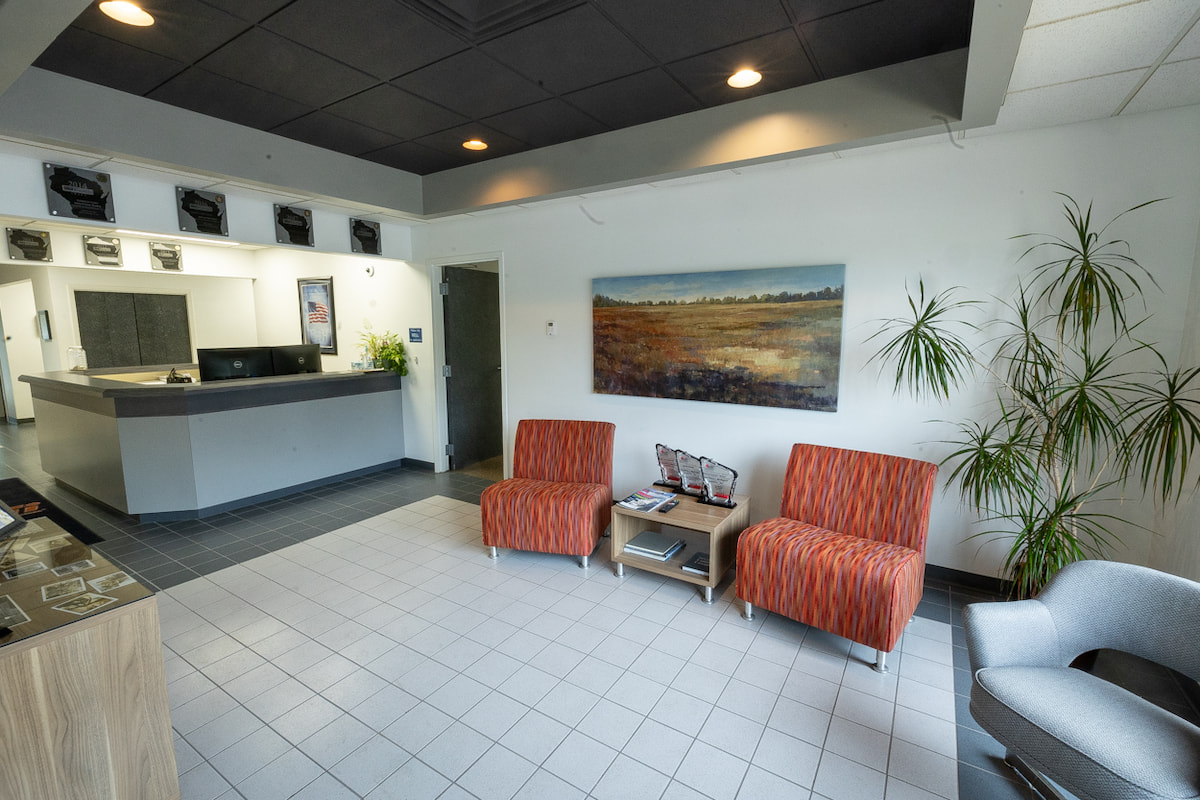 Chairs and front desk in the front lobby of Hurckman's production office